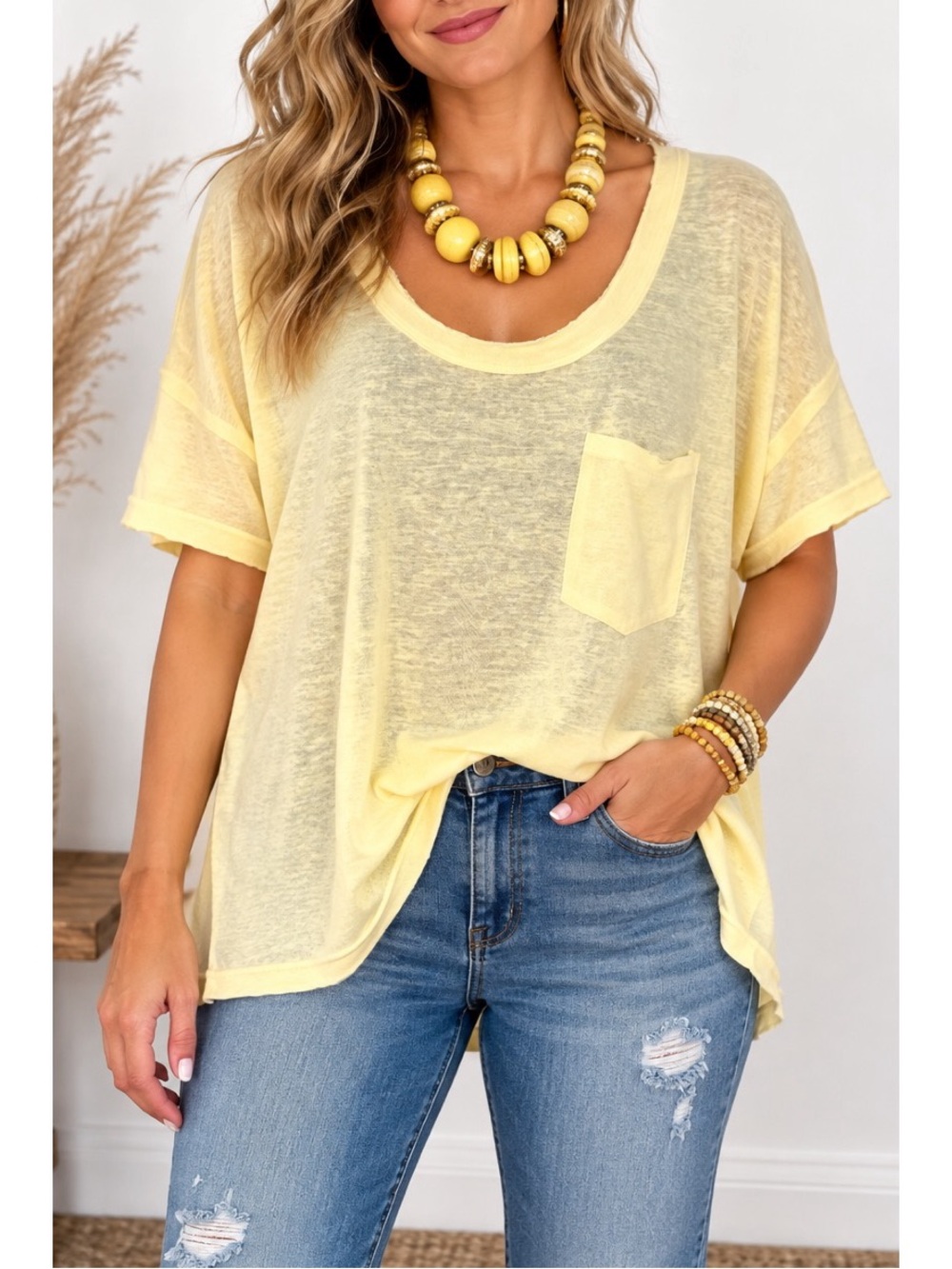 White Birch pale yellow short sleeve top, with front pocket